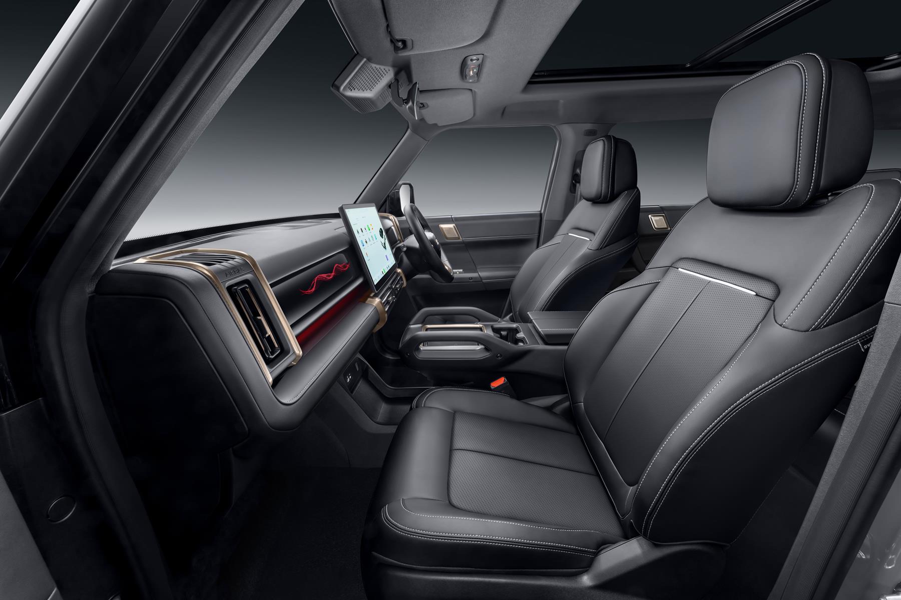 Inside, the 03T continues its blend of comfort and technology. 