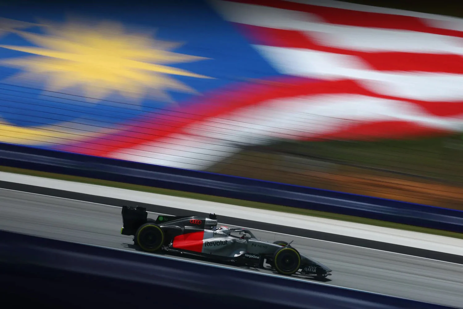 Bold strategy and sharp execution see Audi Revolut F1 Team charge through chaos in Sepang
