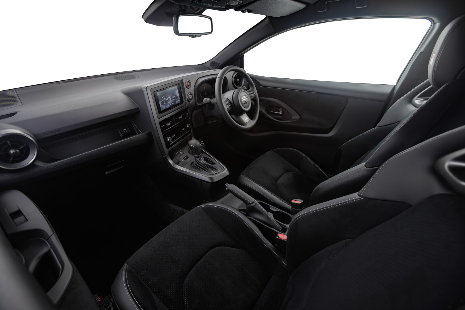 Inside, the cockpit has been reimagined with a clear focus on the driver. Inspired by rally-car ergonomics, key controls and displays have been repositioned for better accessibility and visibility. 